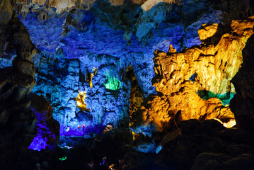 Colorful inside of Hang Sung Sot cave world heritage site in Halong Bay, Vietnam