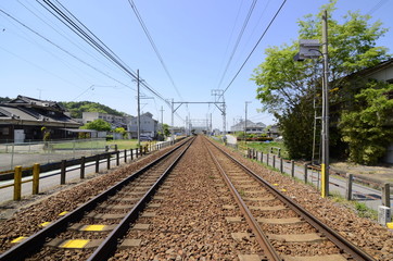 Fototapeta na wymiar Railroad track in local town.