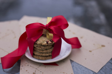 stack of cookies with ribbon bow red