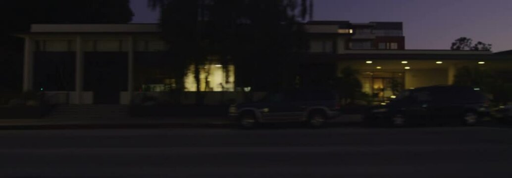 Left Side view of a Driving Plate: Car travels at dusk on West Colorado Boulevard in Pasadena, California from St John Avenue across Colorado Street Bridge to San Rafael Avenue.