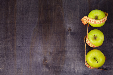 Apples and measuring tape
