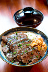 Beef Steak Donburi with egg and fried garlic