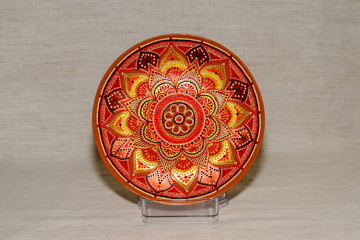 Decorative ceramic dish painted with hands. Art, handmade.