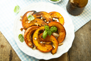 Grilled pumpkin with garlic and fresh basil