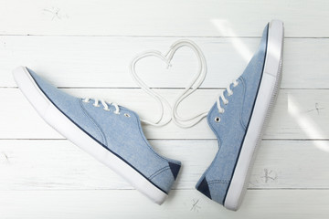 Light everyday summer shoes, shoelaces in the shape of heart and love.