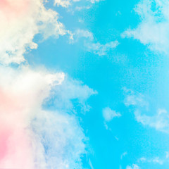 Fototapeta na wymiar White and Pink clouds in blue sky with empty space.