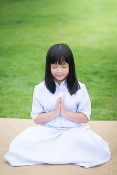  girl praying in the park