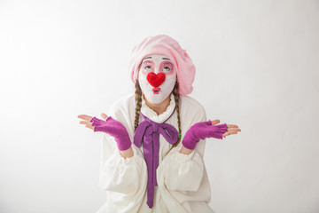 mime girl in a snowman costume. Man with emotions on a white background.