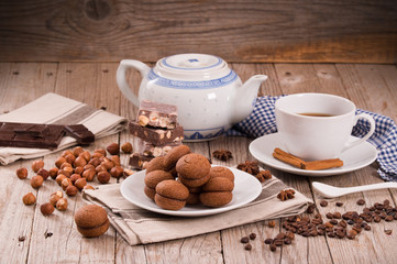 Hazelnut shortbread sandwiches filled with chocolate cream. 