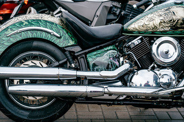 Closeup of motorbike with lots of chrome details. Modern powerful perfomance road motorcycle shiny...