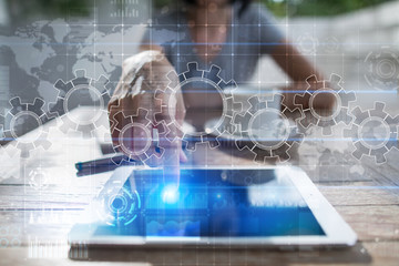 Gears on virtual screen. Business strategy and technology concept. Automation process.