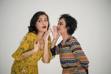  portrait of a two beautiful woman on on white background