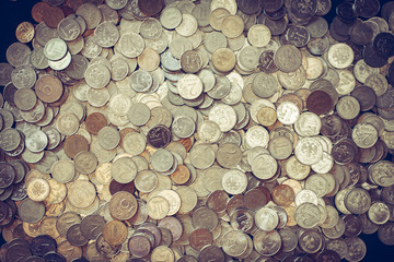 Background of gold and silver coins.