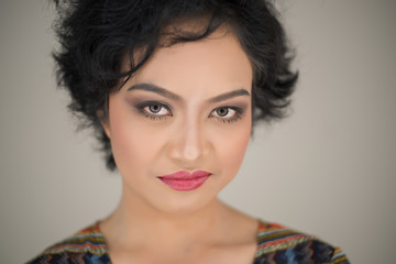 Young woman envy on  white background