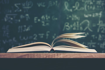  Open book with green board background