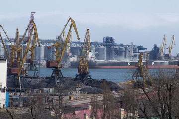 Fototapeta na wymiar Panorama of the sea port cranes ships