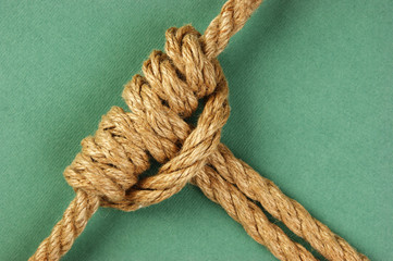 Rope with marine knot  on the green background