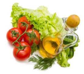 Set vegetable and jug of vegetable oil isolated on the white background