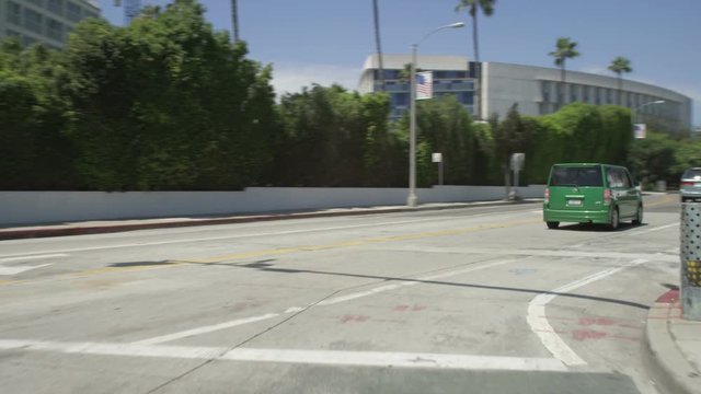 Right Front Three Quarter view of a Driving Plate: Car traveling on Pico Boulevard in Santa Monica, California, turns right onto Main Street and continues, turns right onto Olympic Drive, and continues to the intersection with 4th Street.