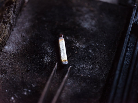 Piece of metal on table