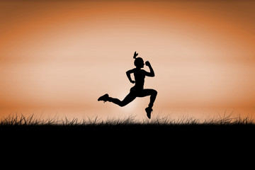 Obraz na płótnie Canvas Fit brunette running and jumping against sunrise