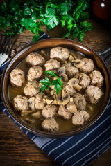 Delicious homemade swedish meatballs with mushroom cream sauce. Small depth of field.