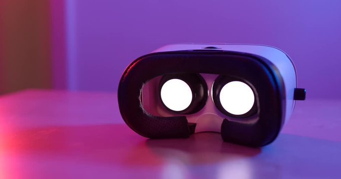VR device with movie playing inside with sci-fi lighting