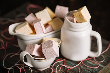 Still life with homemade marshmallow on wood background