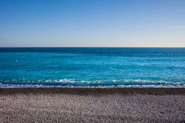 Pebble Beach And Sea Background