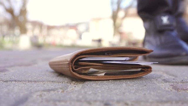 man finds a lost wallet with money and documents