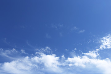 Naklejka na ściany i meble Clouds on the bottom of the sky background