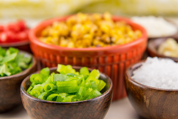Sliced Green Onions in Wooden Bowl