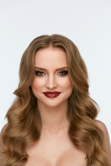 Naklejka premium Beauty Makeup. Young Woman With Beautiful Face And Hairstyle
