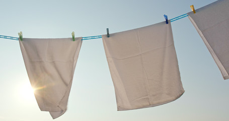 White towel drying under sunset