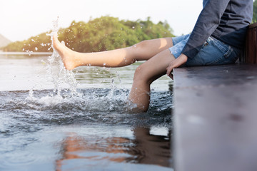 Happy Asian woman traveler relaxing.