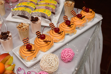 Dessert table for a party with food decoration