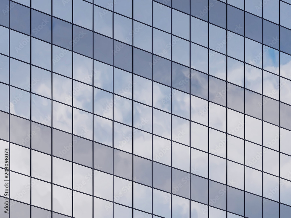Poster view of the clouds reflected in the glass office building. 3d rendering