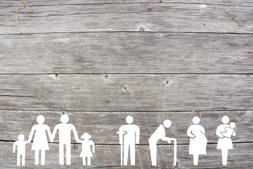 Family and Weak social categories welfare concept on wooden background