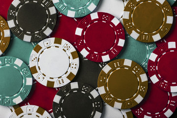 background of set of colored chips for playing poker