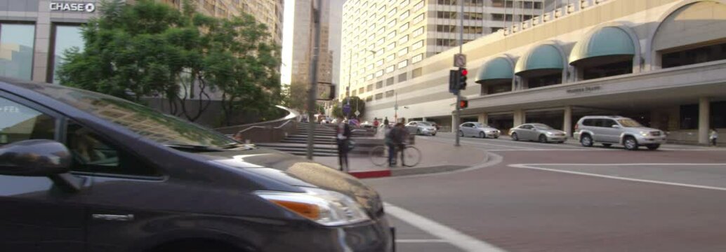 Left Side view of a Driving Plate: Car travels on Figueroa Street in Los Angeles from 7th Street to 1st Street at sunset.