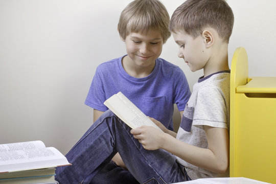 Kids Reading Books At Home