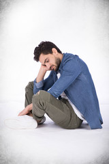 sad man hand on cheek