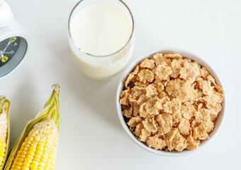 Healthy Corn Flakes with milk for Breakfast on table, food and drink