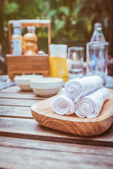 Rolled up white spa towels, selective focus, vintage