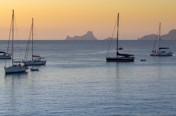 Sailboats at sunset