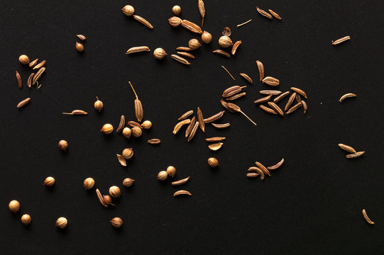 Sesame Seeds With Bread On A Black Background