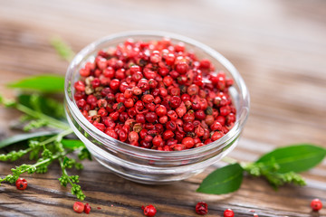 Fresh red peppercorns in the bowl