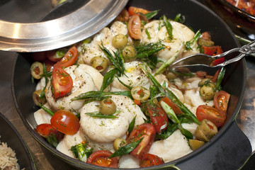 Mediterranean white fish meal in a pan