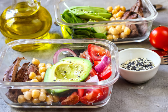 Healthy meal prep containers with chickpeas, goose meat