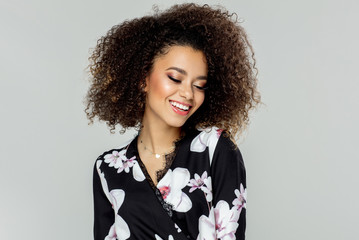 Beautiful african american young female model smiling